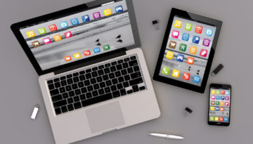 3d render of devices with laptop computer, tablet pc and touchscreen smartphone. top view. all screen graphics are made up.