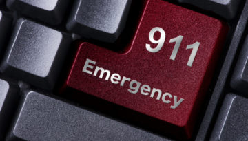 keyboard enter button labeled 911 emergency