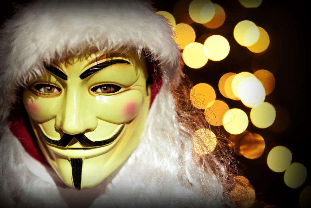 christmas image hacker with mask and santa clothes